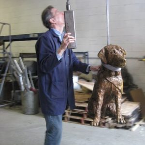 Bert the yellow lab at the studio with James Montgomery, owner of The New England Sculpture Service in Chelsea, MA.